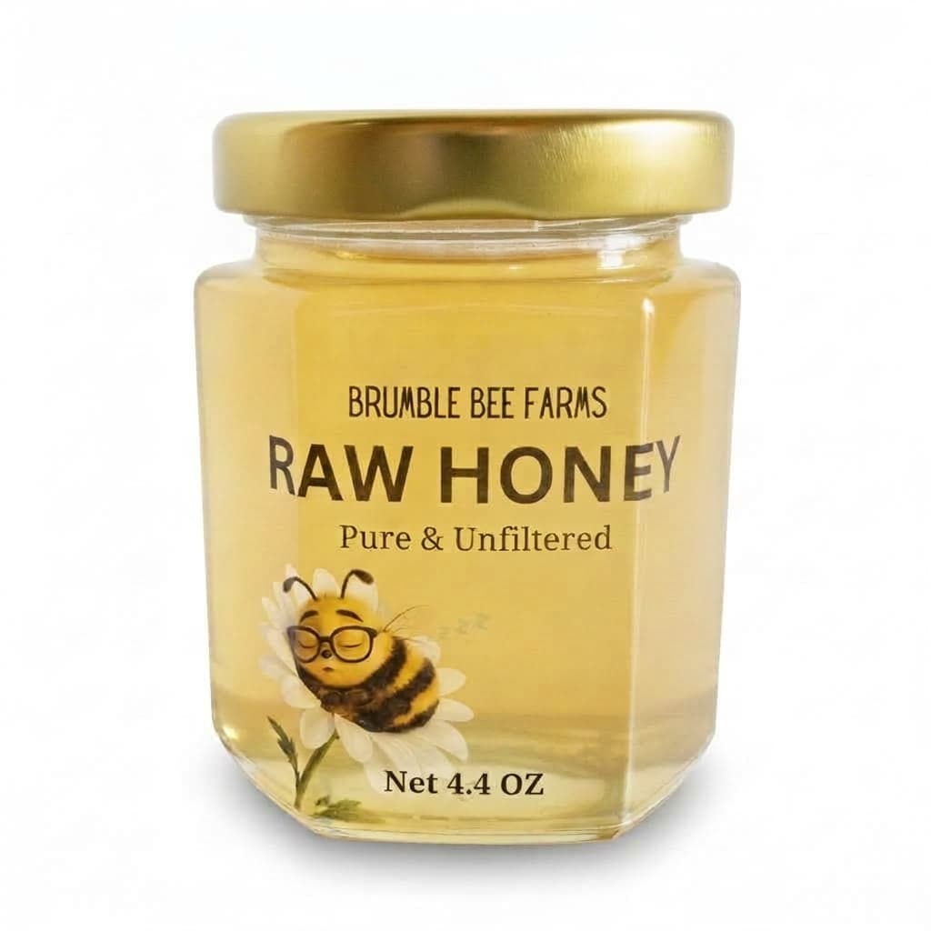 A 4.4-ounce jar of Brumble Bee Farms raw honey, pure and unfiltered, with the sleeping bee on the label.